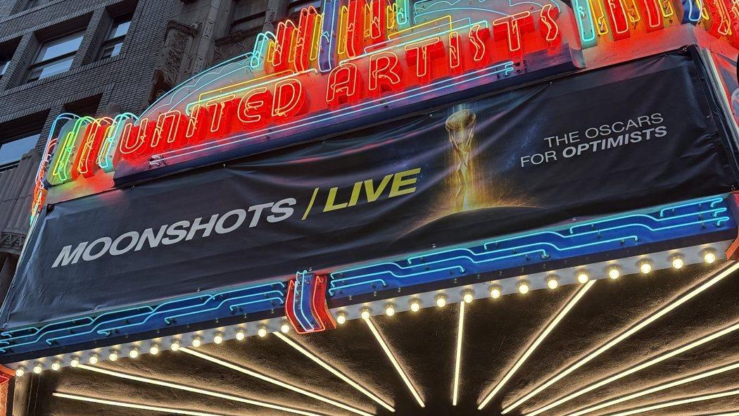 The United Theater marquee reads "Moonshots Live, The Oscars for Optimists", 25 September 2026.